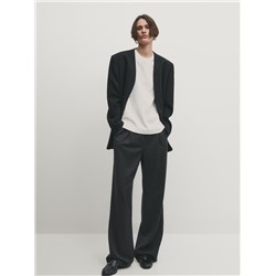 Pantalón traje ancho pinzas