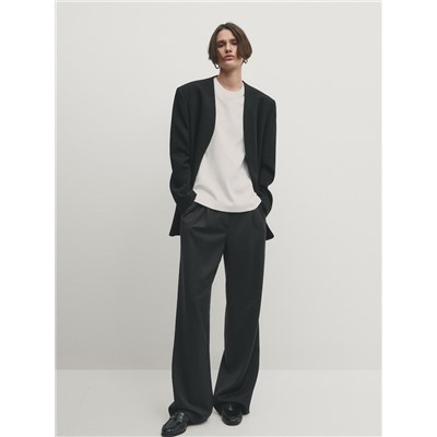 Pantalón traje ancho pinzas