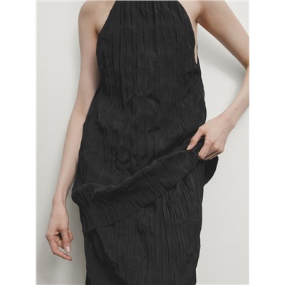Long pleated halterneck dress