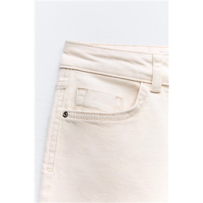 JEANS Z1975 MINI FLARE TIRO ALTO BAJO ASIMÉTRICO