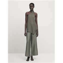 Top asimétrico cuello halter