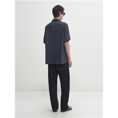 Camisa lino manga corta bolsillos
