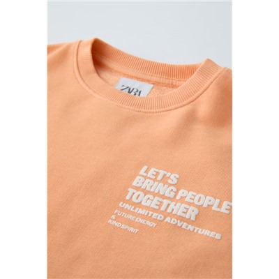 SUDADERA TEXTO RELIEVE