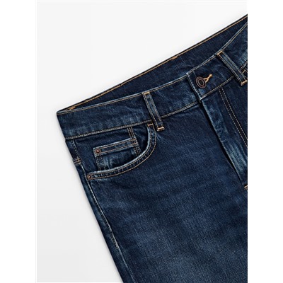 Jeans tiro alto bootcut