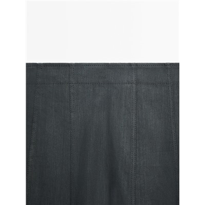 Long flared skirt with topstitching detail