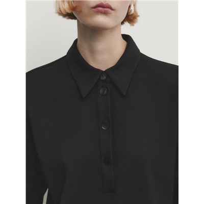 Vestido midi abertura cuello polo