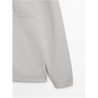 Cárdigan punto cremallera cuello camisero