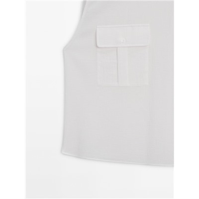 Top fluido algodón bolsillos