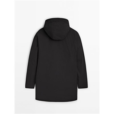 Parka negra relleno plumón y plumas capucha