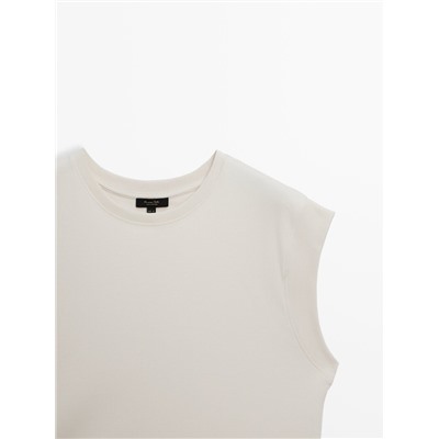Camiseta sin mangas 100% algodón