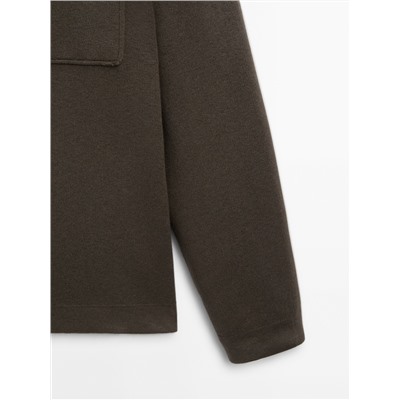 Cárdigan punto cremallera cuello camisero