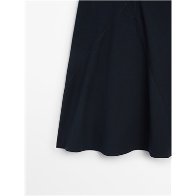 Falda midi algodón detalle cortes