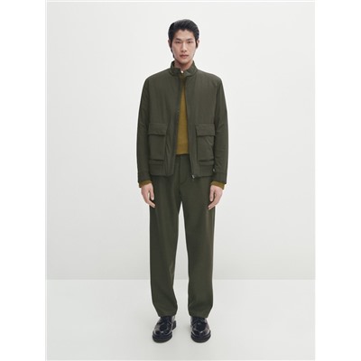 Chaqueta bi-stretch bolsillos