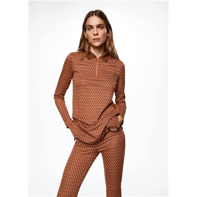 Pantalón flare estampado -  Mujer | MANGO OUTLET España