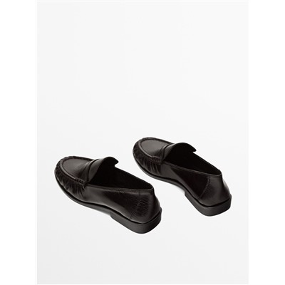 Mocasín antifaz fruncido
