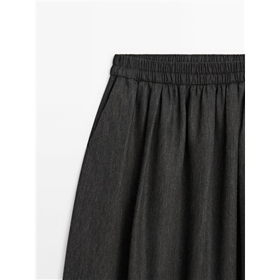 Falda midi cintura elástica