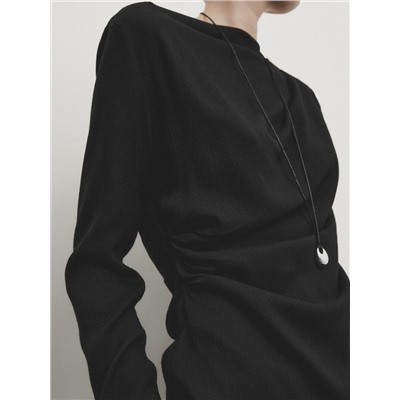 Blusa manga larga detalle drapeado