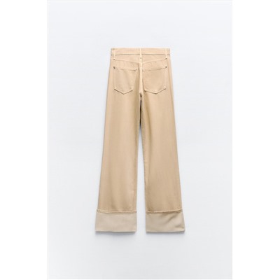 JEANS TRF COLOR BAJO VUELTA TIRO ALTO