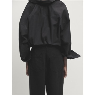 Pantalón fluido lyocell pinzas
