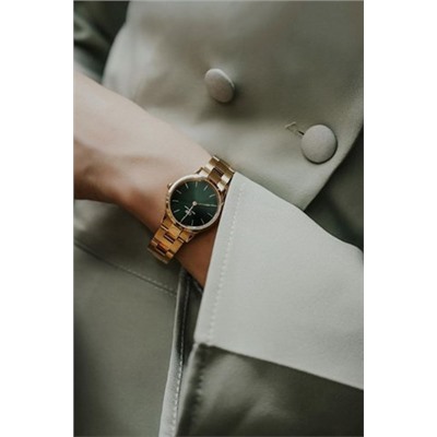 Reloj de cuarzo de acero y chapado en oro amarillo Iconic Link Emerald