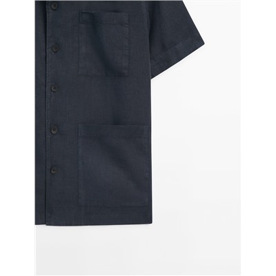 Camisa lino manga corta bolsillos