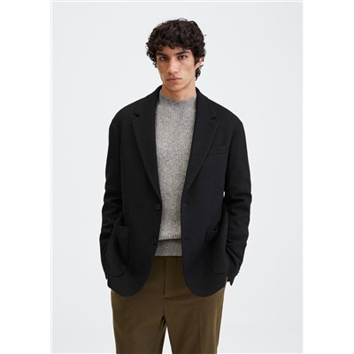 Americana regular lana virgen  -  Hombre | MANGO OUTLET España