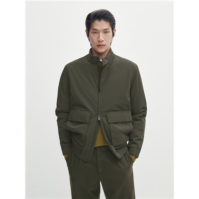 Chaqueta bi-stretch bolsillos