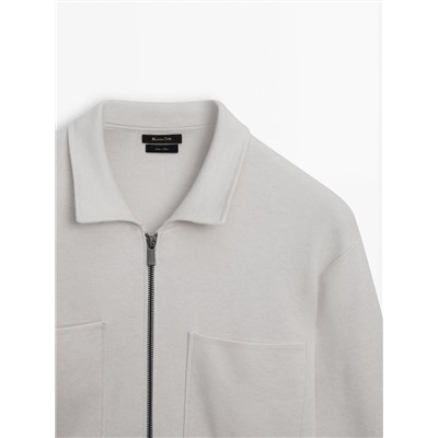 Cárdigan punto cremallera cuello camisero