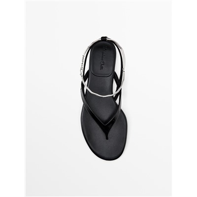 Flat sandals with ankle strap