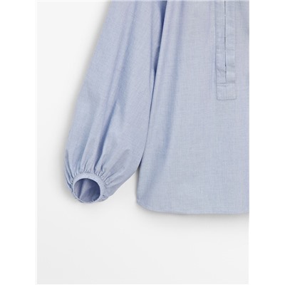Blusa efecto arrugado