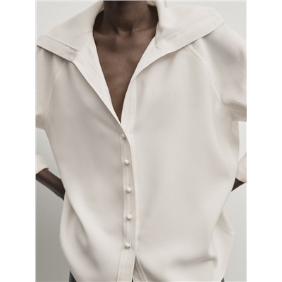 Camisa cuello volumen botones cerámica