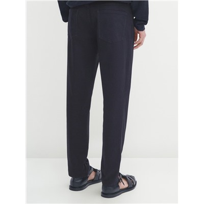 Pantalón tejanero sarga tapered fit