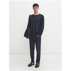 Pantalón tejanero sarga tapered fit