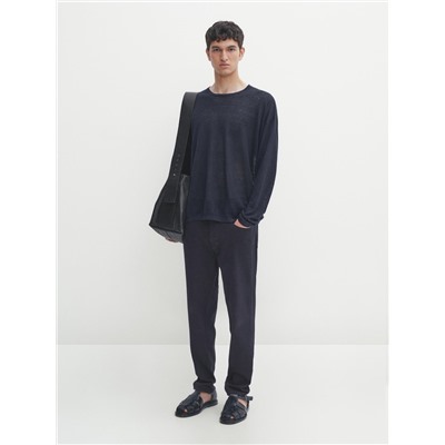 Pantalón tejanero sarga tapered fit
