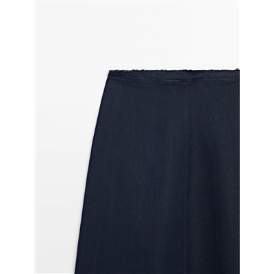 Falda midi detalle botones laterales