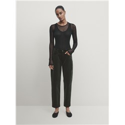 Pantalón micropana slim fit detalle costura