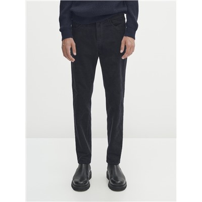 Pantalón tejanero micropana tapered fit