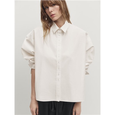 Camisa cropped detalle botones
