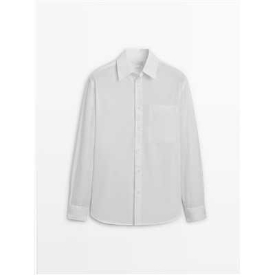 Camisa popelín bolsillo regular fit