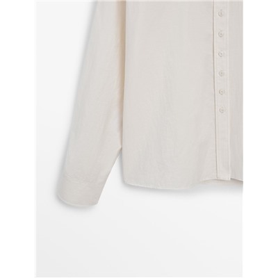 Camisa cropped detalle botones