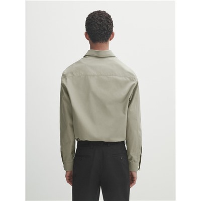Camisa popelín bolsillo regular fit
