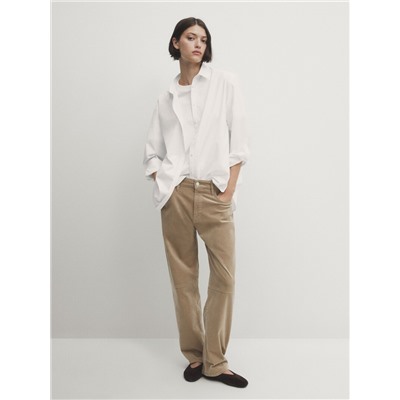 Pantalón micropana slim fit detalle costura