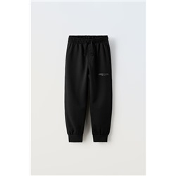 PLUSH TROUSERS WITH SLOGAN