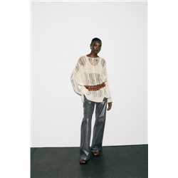 ASYMMETRIC OPEN CABLE-KNIT SWEATER