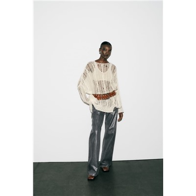 ASYMMETRIC OPEN CABLE-KNIT SWEATER
