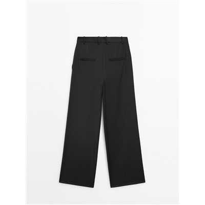 Pantalón traje ancho pinzas