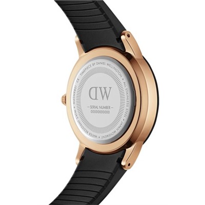 Reloj de cuarzo de caucho Motion - Negro y rosa dorado