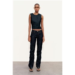 JEANS TRF EFECTO ARRUGADO TIRO MEDIO