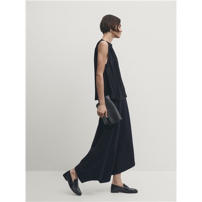 Top satinado detalle rib