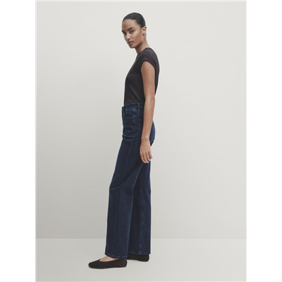 Jeans tiro alto straight fit